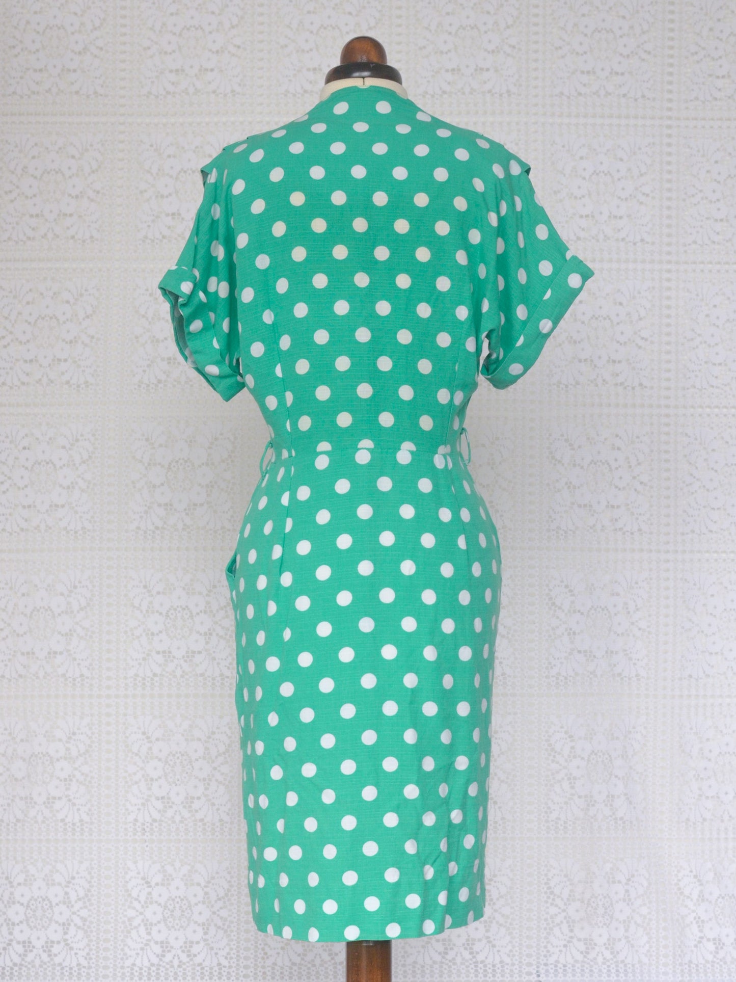 1980s green and white polkadot short sleeve wiggle dress