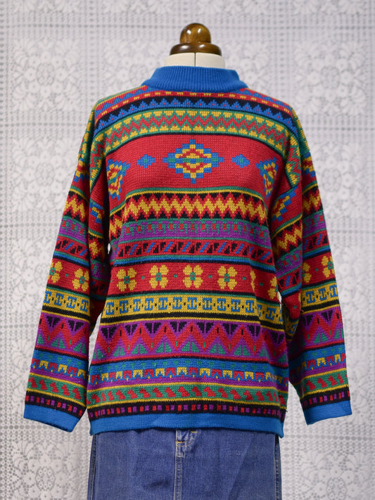 1990s blue, red and yellow colourful geometric floral patterned jumper