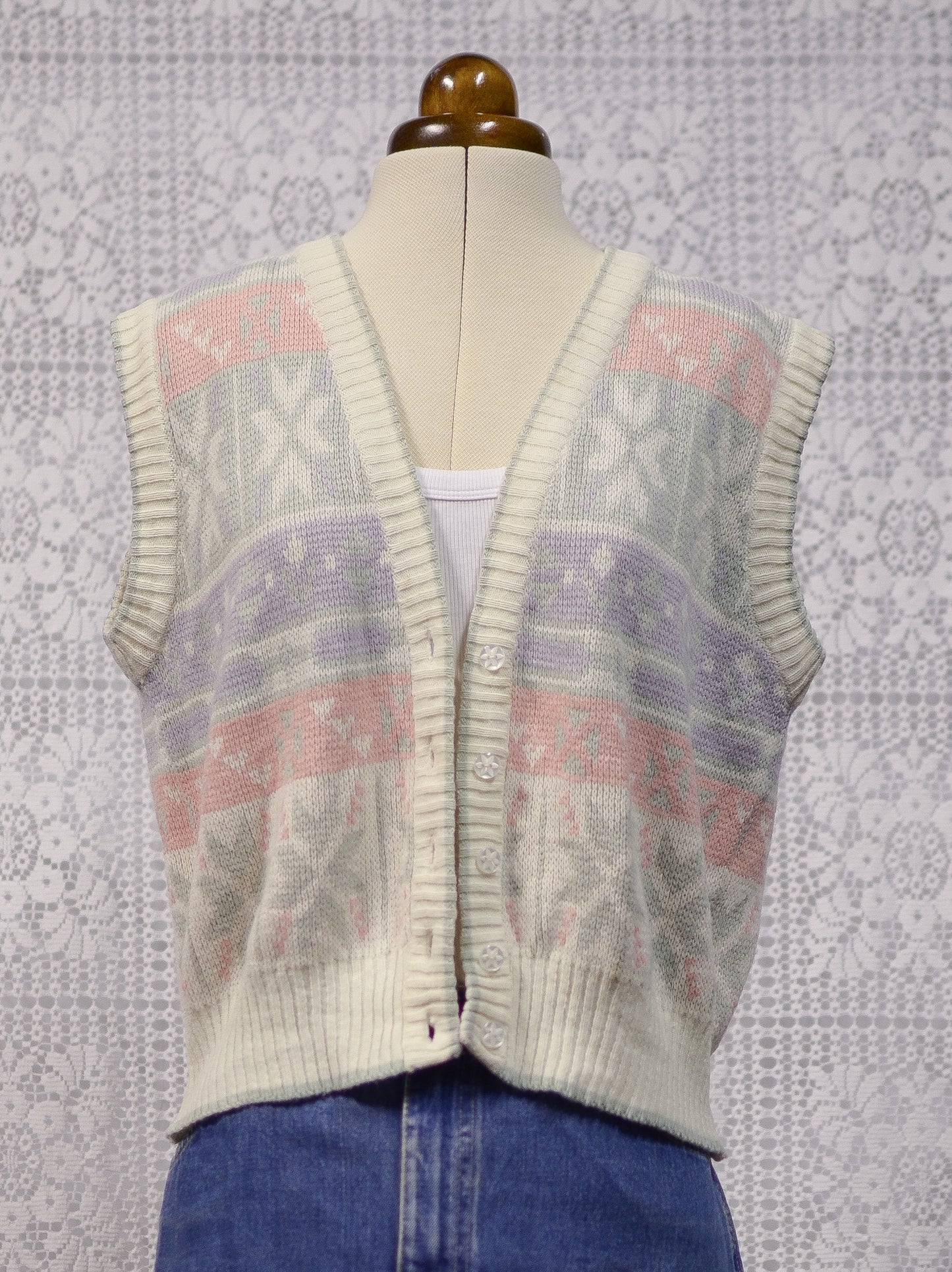 1980s white, pink, pastel blue and green snowflake festive knitted waistcoat