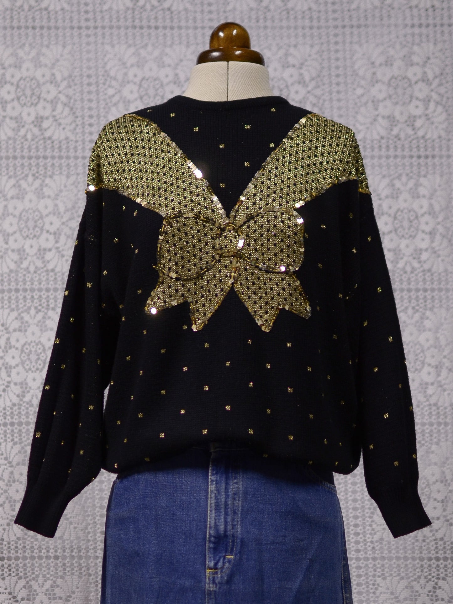 1980s black and gold glittery sequin bow jumper