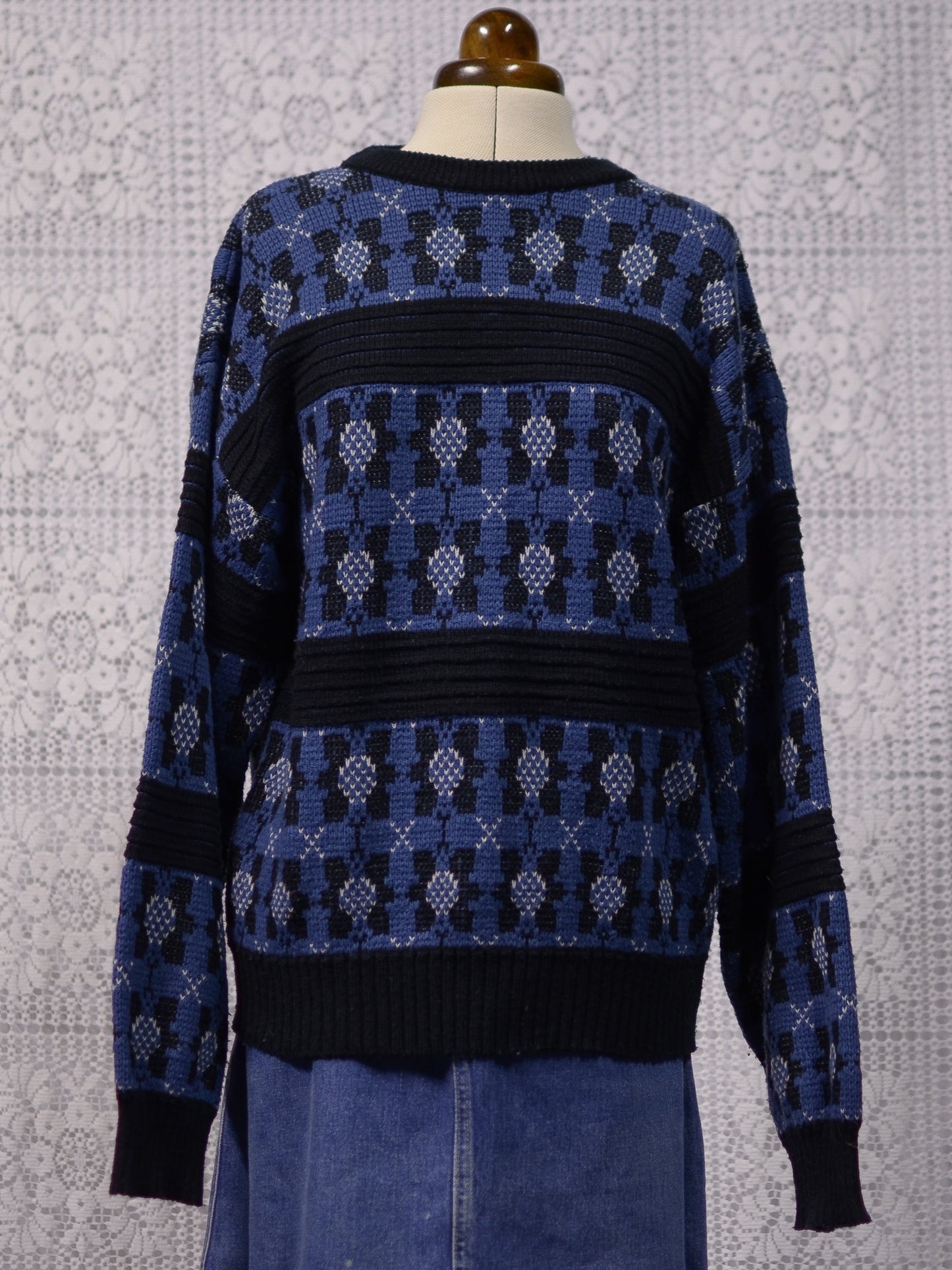 1980s blue and black geometric floral pattern jumper