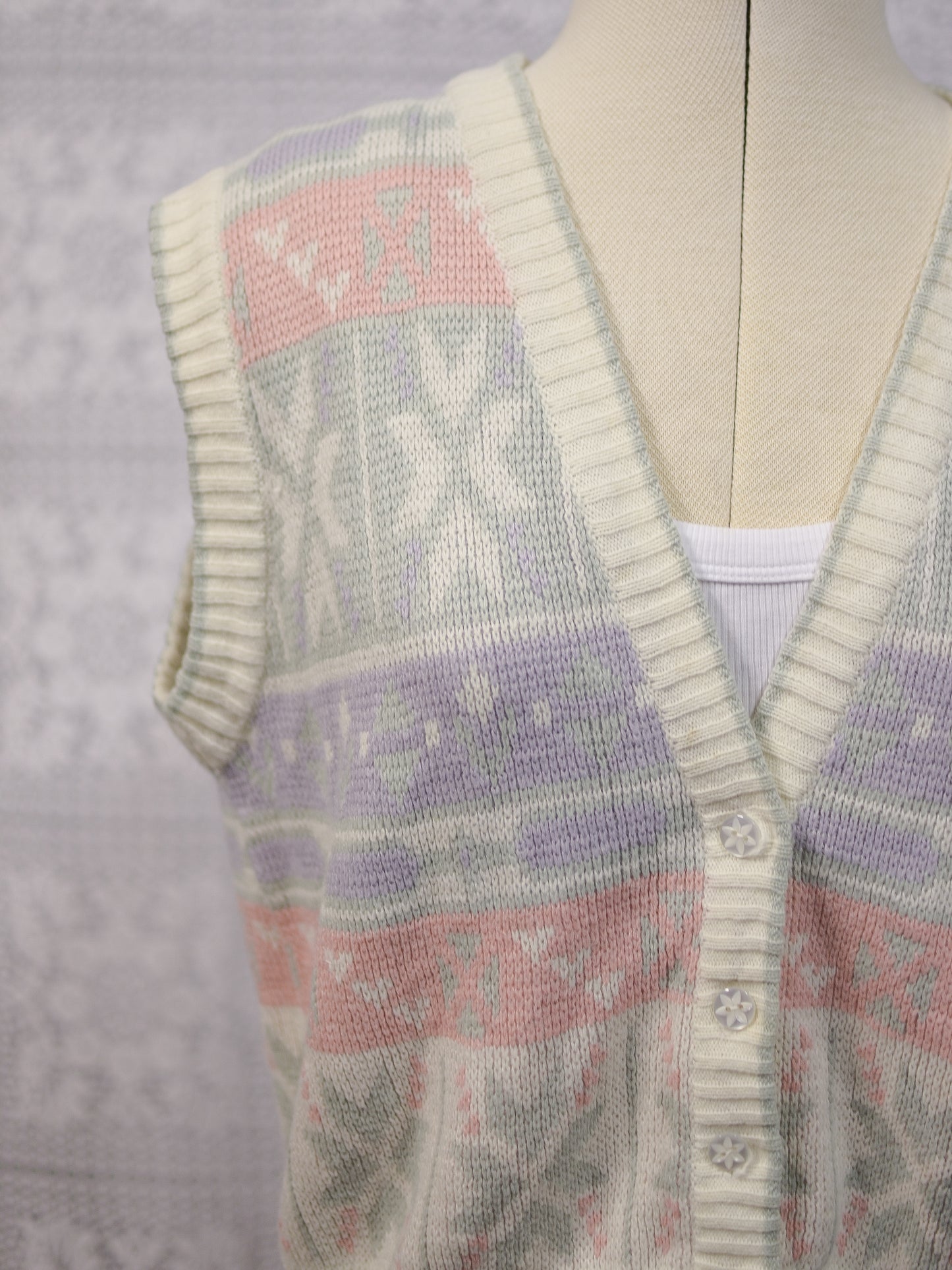 1980s white, pink, pastel blue and green snowflake festive knitted waistcoat