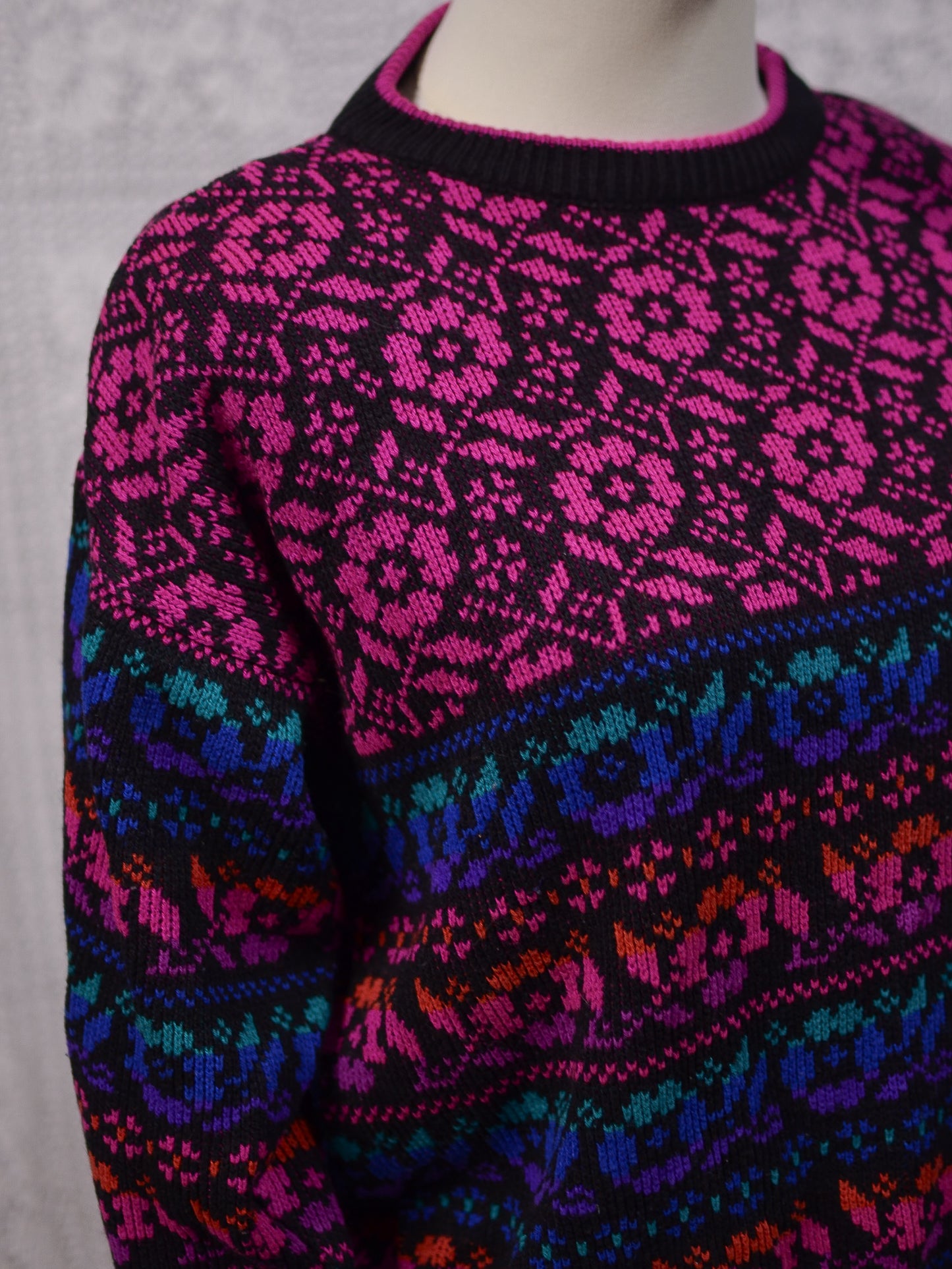 1980s black, pink, blue, purple and green floral pattern jumper
