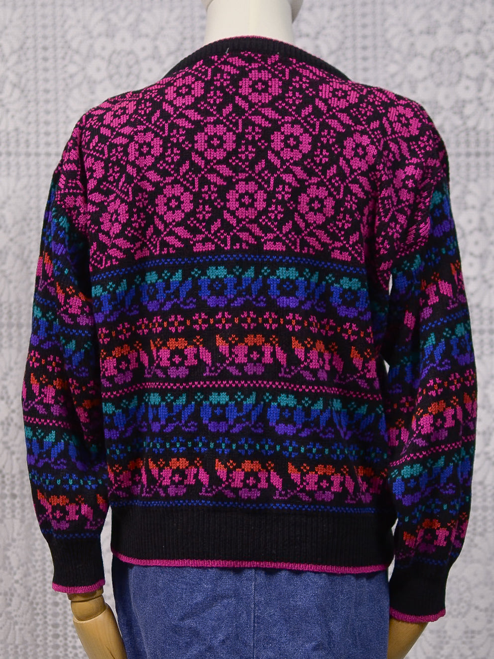 1980s black, pink, blue, purple and green floral pattern jumper