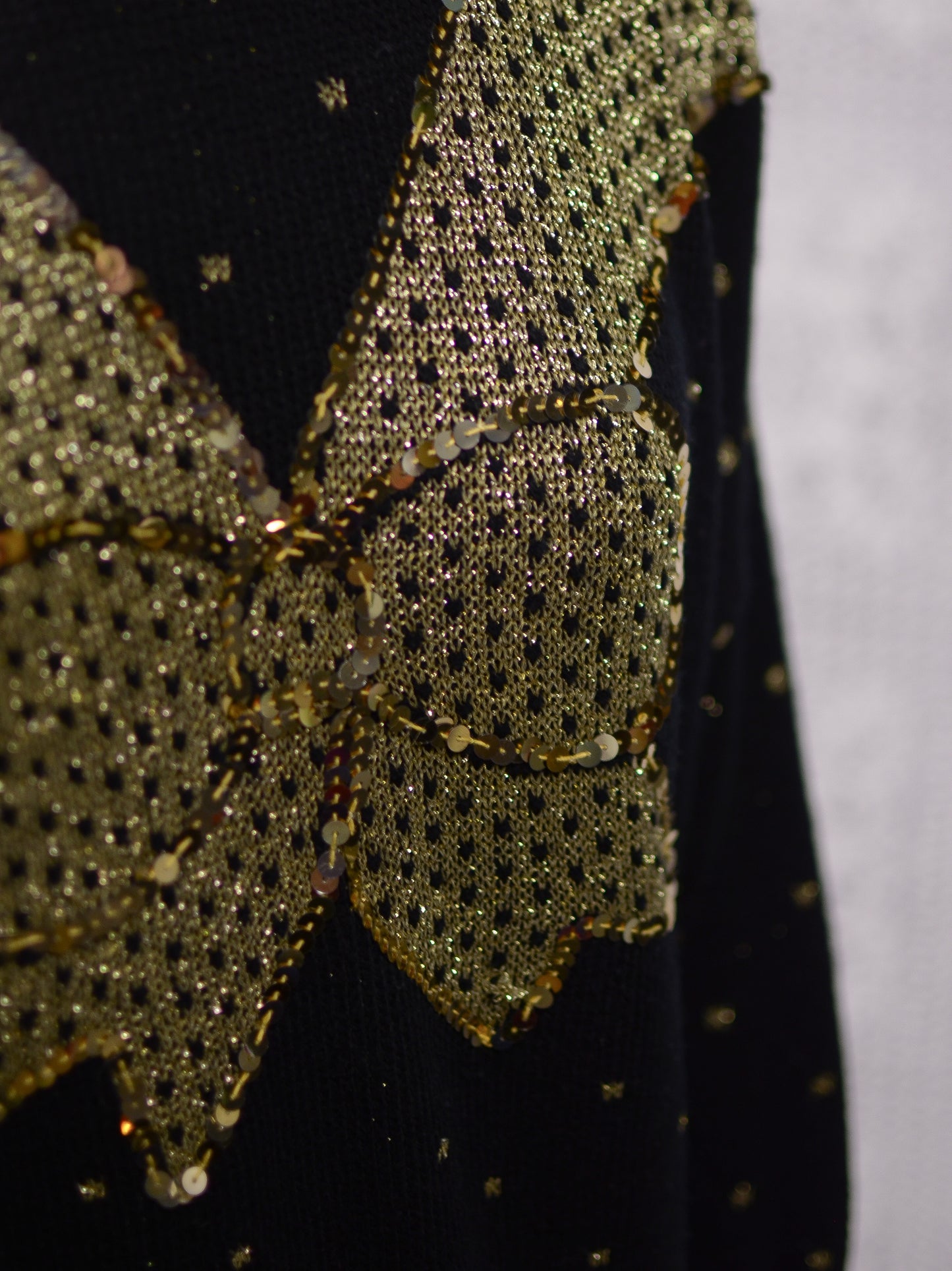 1980s black and gold glittery sequin bow jumper