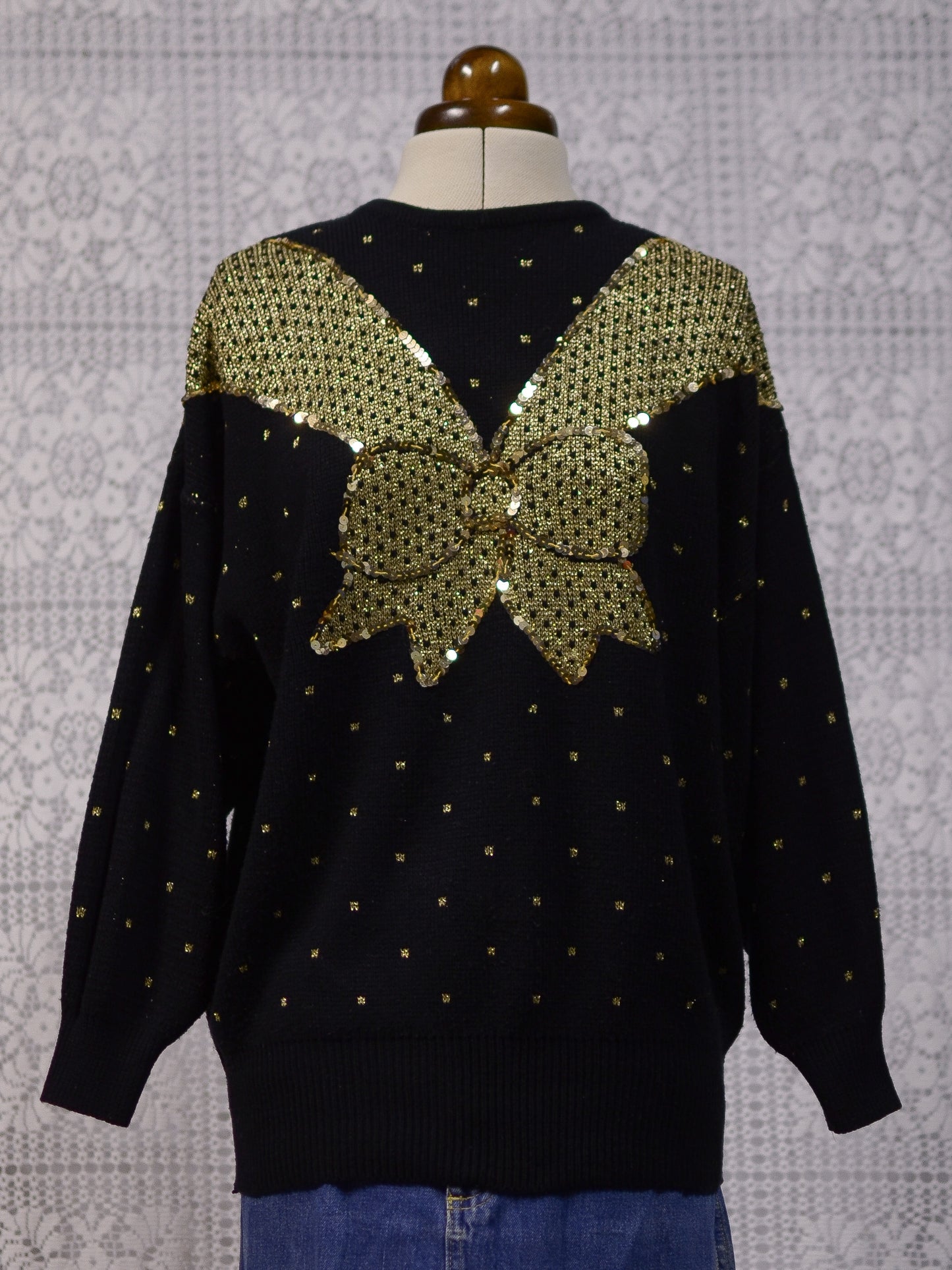 1980s black and gold glittery sequin bow jumper