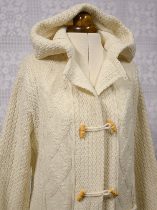 1970s St Michael cream cable knit hooded duffle style long cardigan with toggle buttons