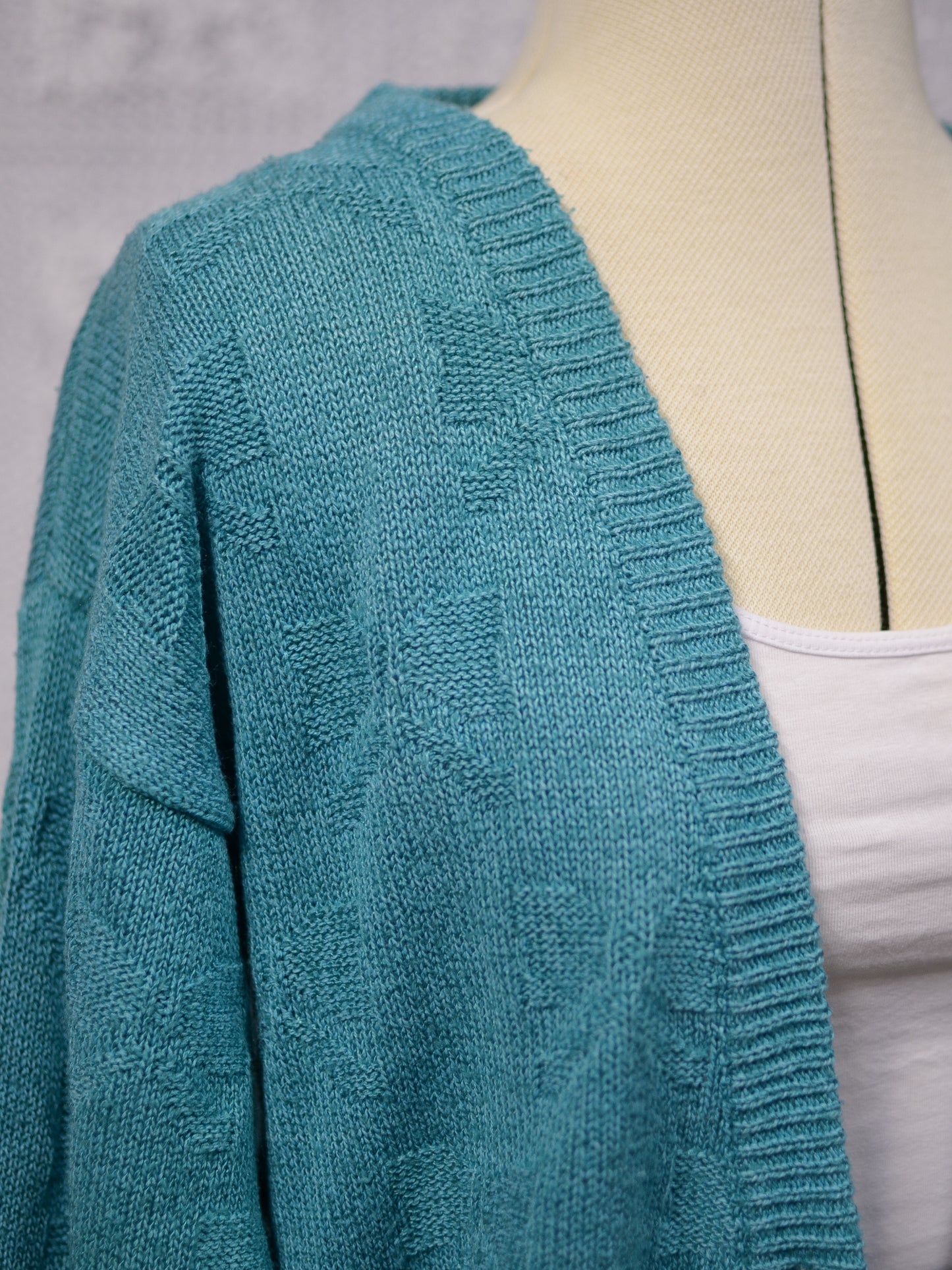 1980s turquoise green bow patterned slouchy v-neck cardigan