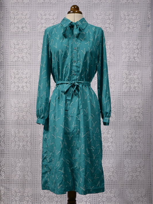 1970s turquoise green and white patterned shirt midi dress with matching bow tie and belt