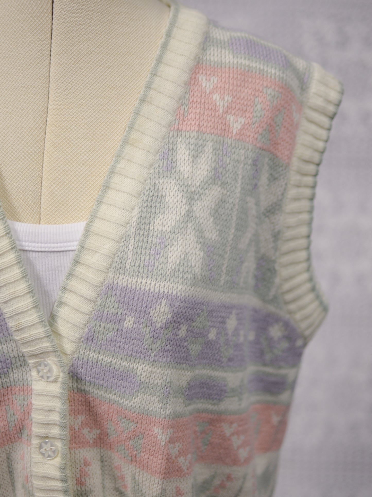 1980s white, pink, pastel blue and green snowflake festive knitted waistcoat