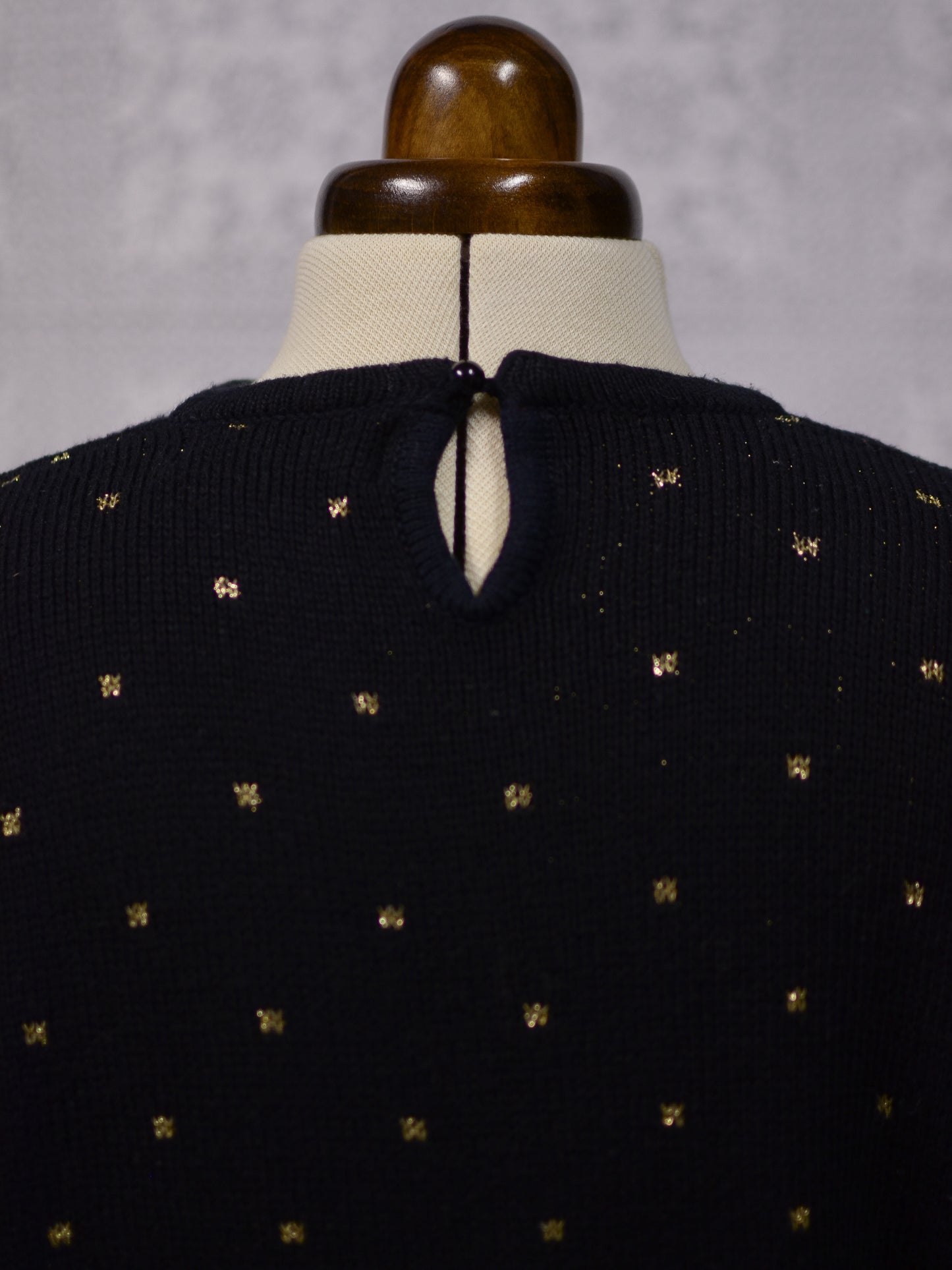 1980s black and gold glittery sequin bow jumper