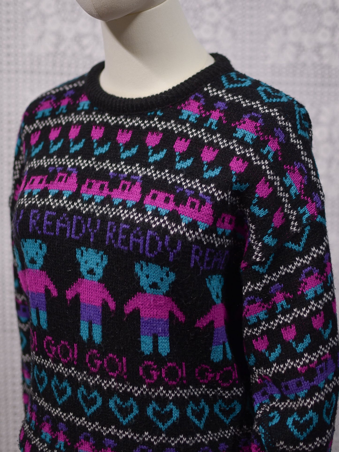 1980s black, pink and purple teddy bear novelty jumper