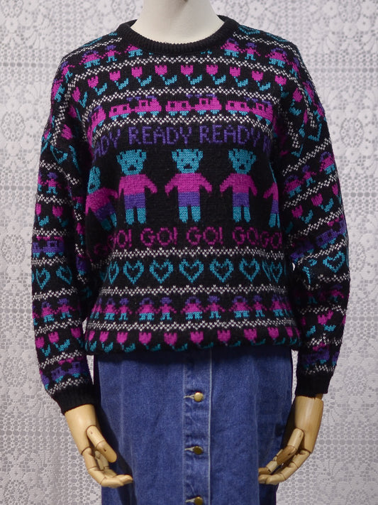 1980s black, pink and purple teddy bear novelty jumper