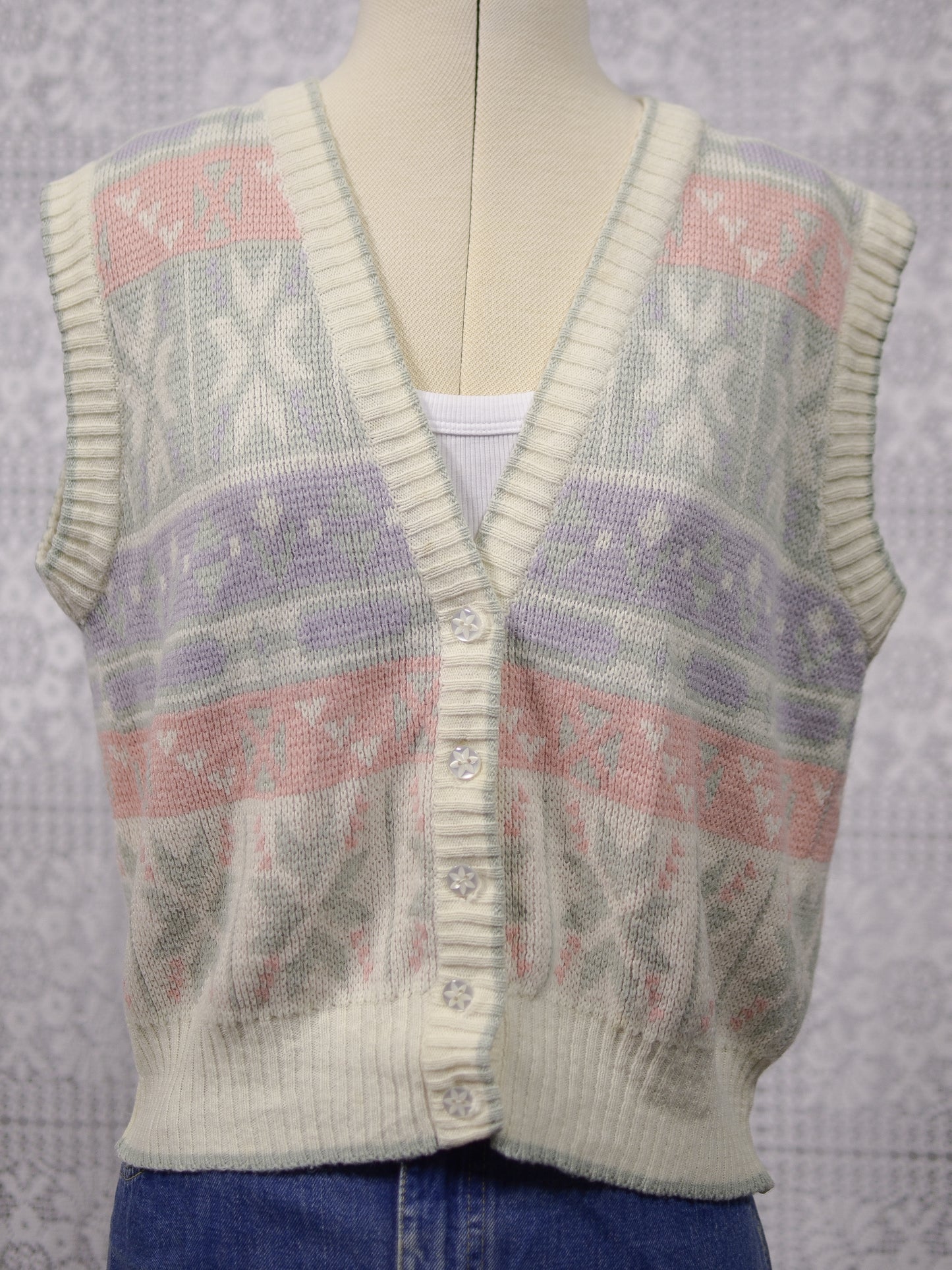 1980s white, pink, pastel blue and green snowflake festive knitted waistcoat