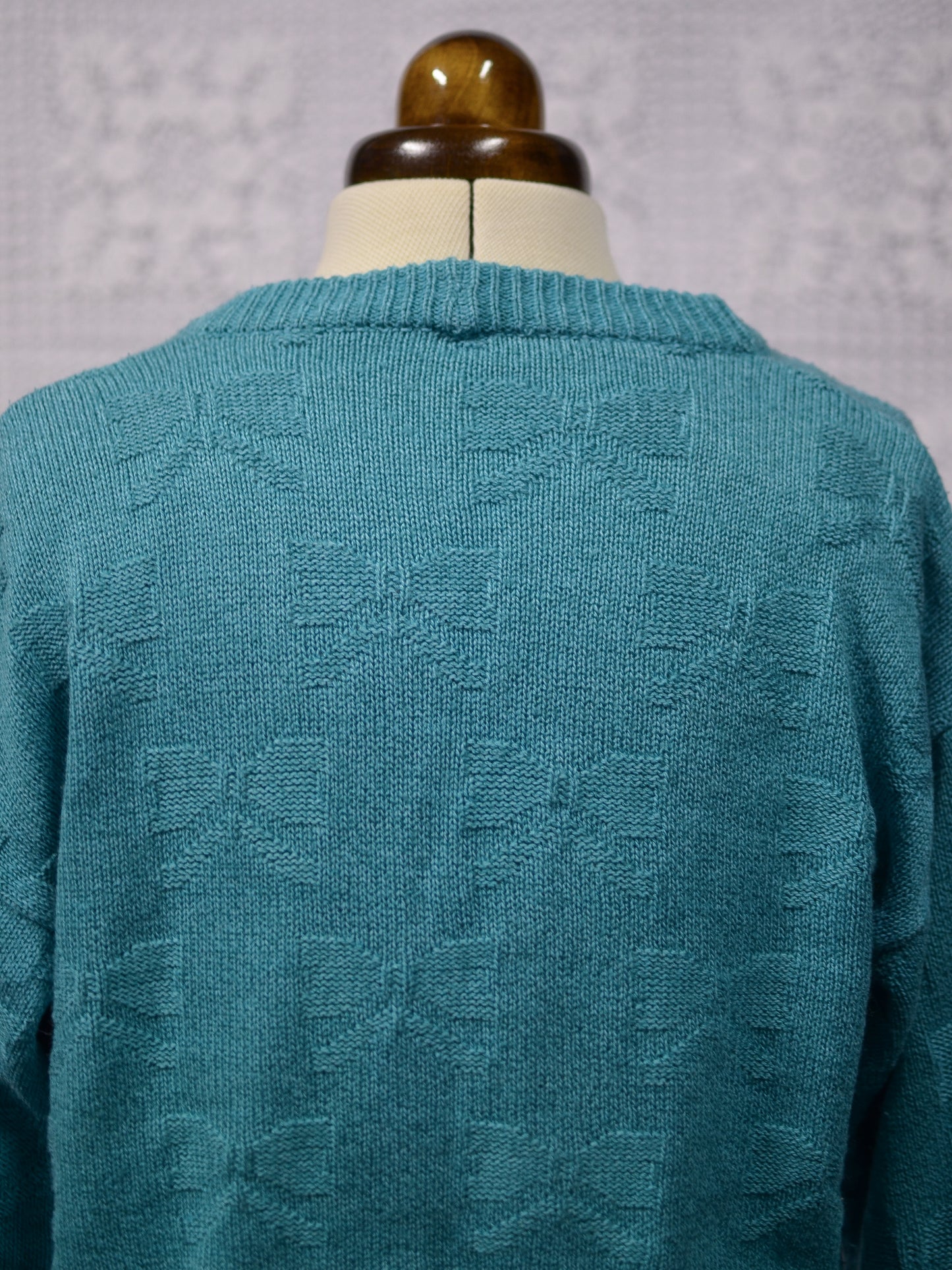 1980s turquoise green bow patterned slouchy v-neck cardigan