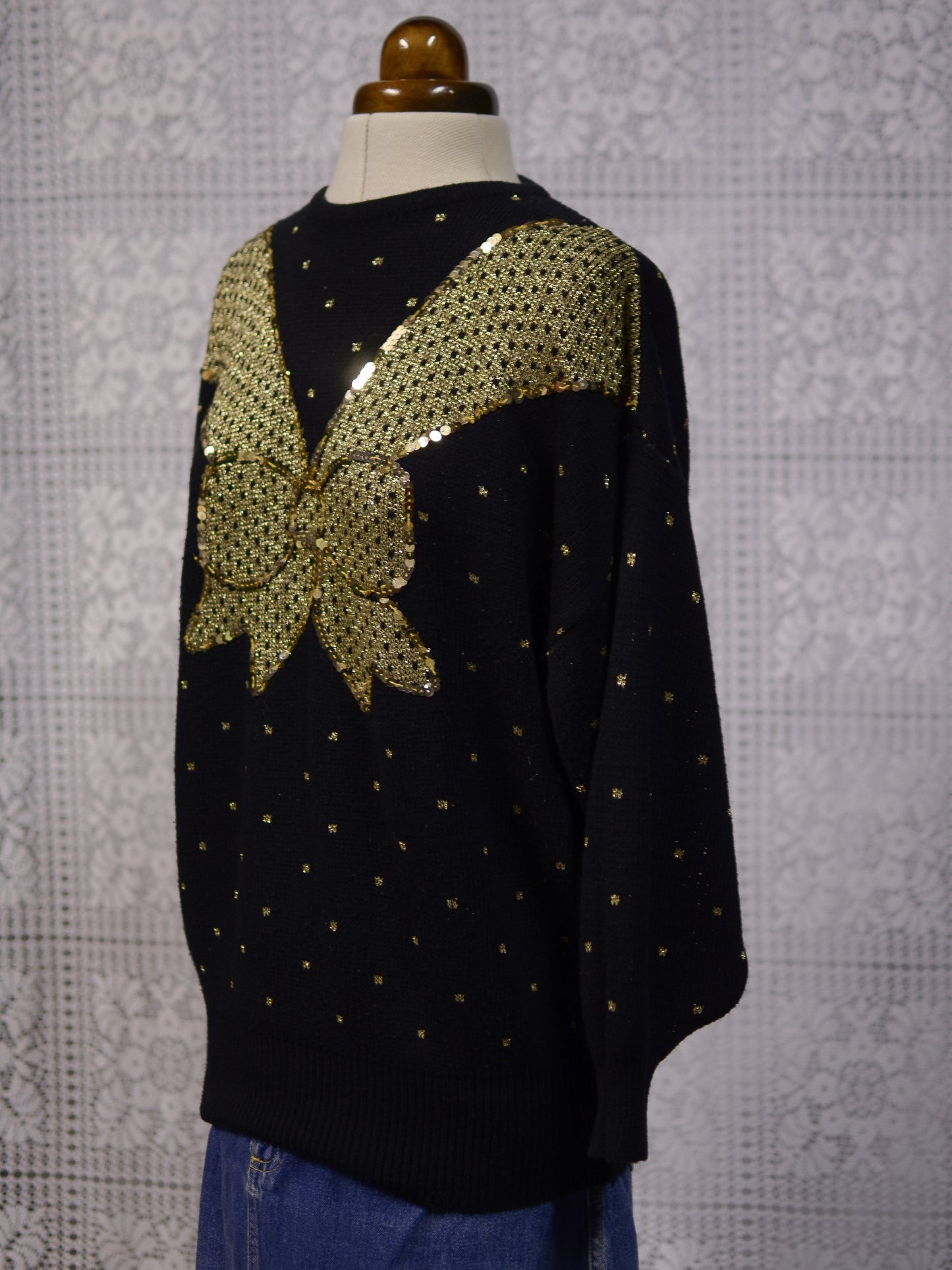 1980s black and gold glittery sequin bow jumper