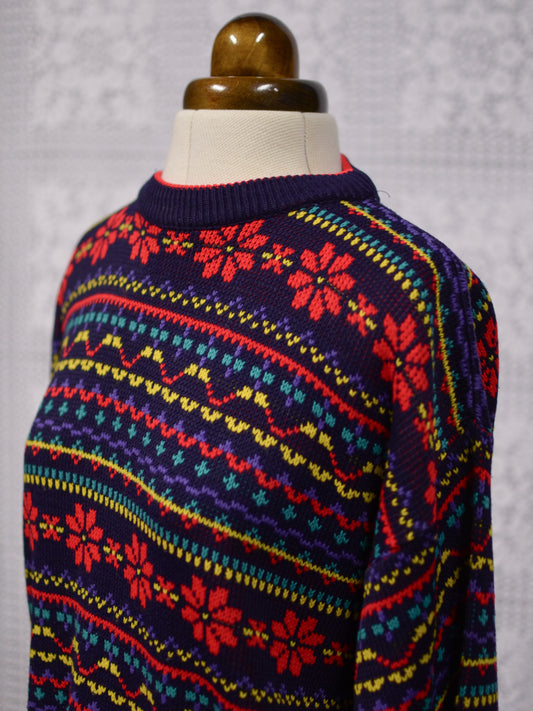 1990s Dorothy Perkins navy blue, red and yellow snowflake festive jumper