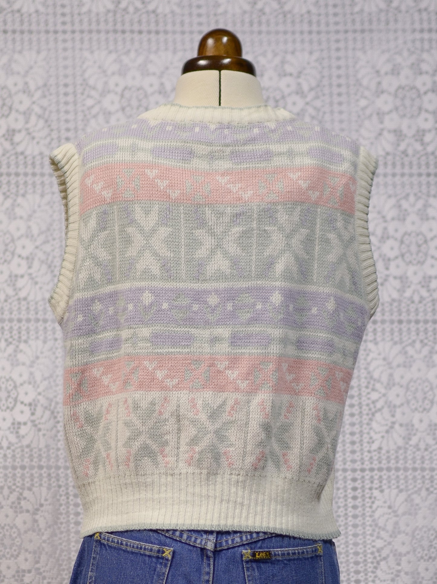 1980s white, pink, pastel blue and green snowflake festive knitted waistcoat