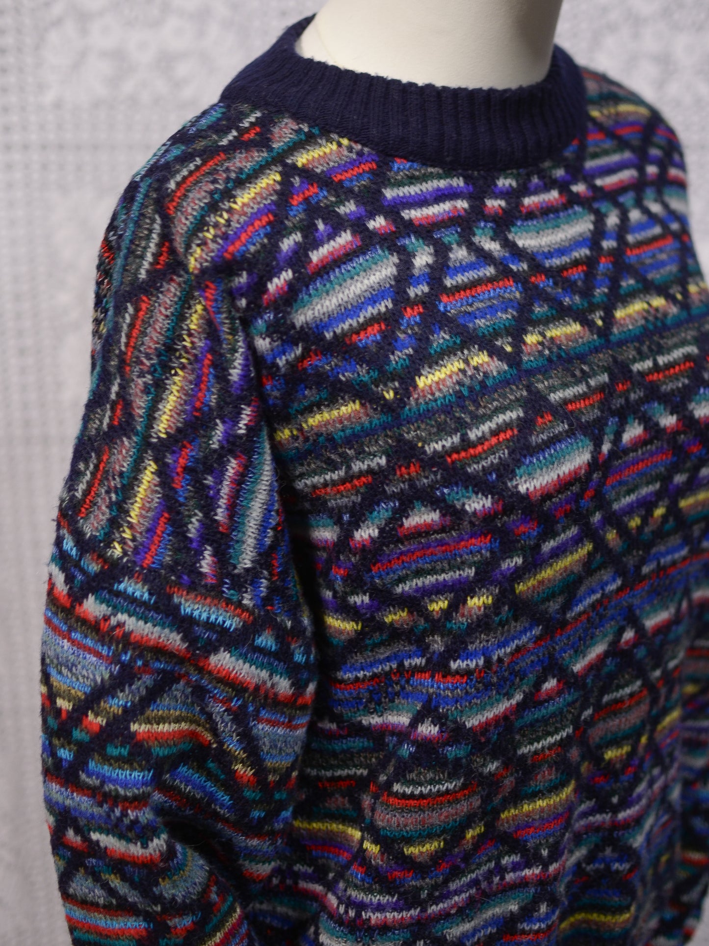 1990s Italian navy blue rainbow geometric pattern jumper