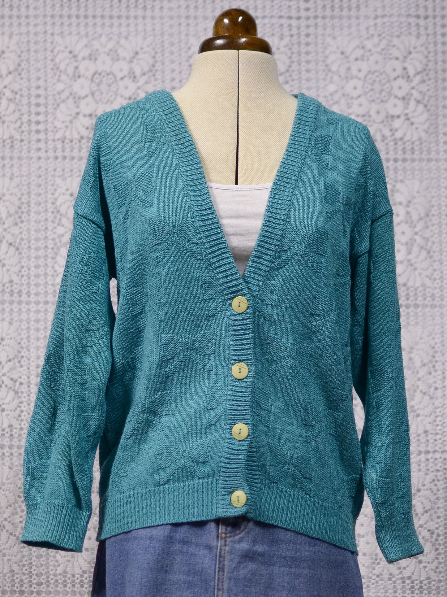 1980s turquoise green bow patterned slouchy v-neck cardigan