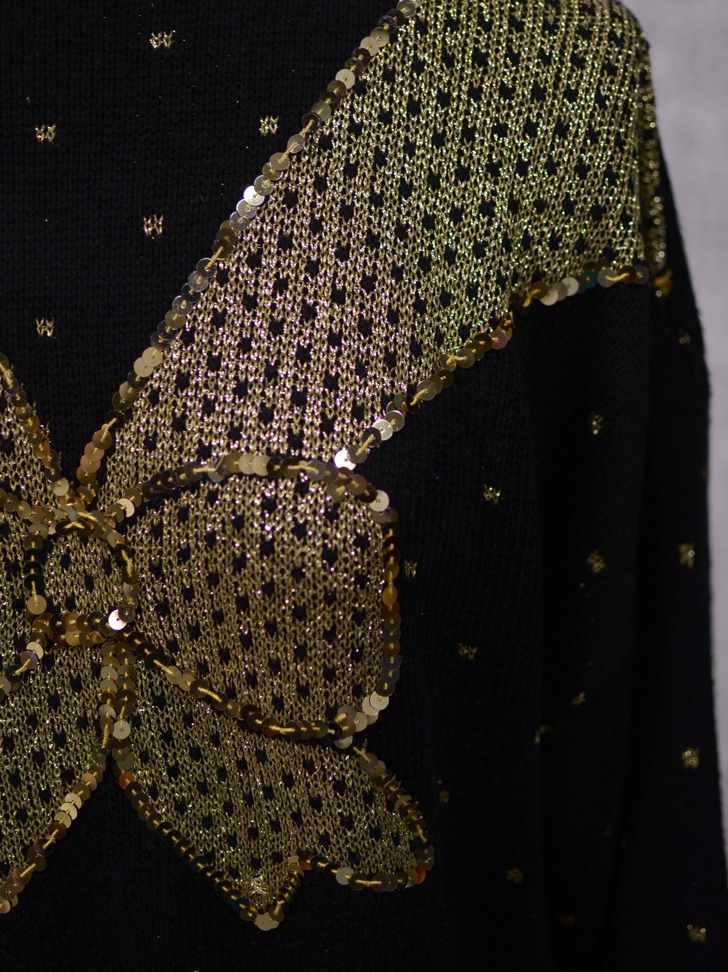 1980s black and gold glittery sequin bow jumper