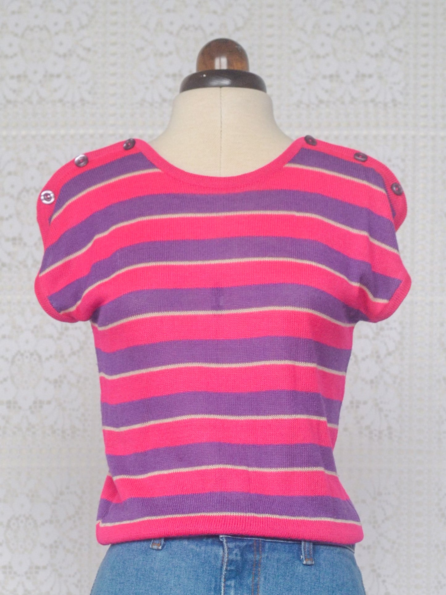 1980s style bright pink and purple cap sleeve jumper