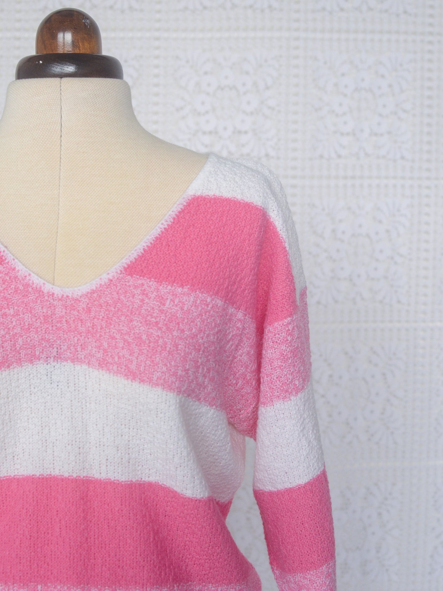 1980s style pink and white stripe v-neck jumper