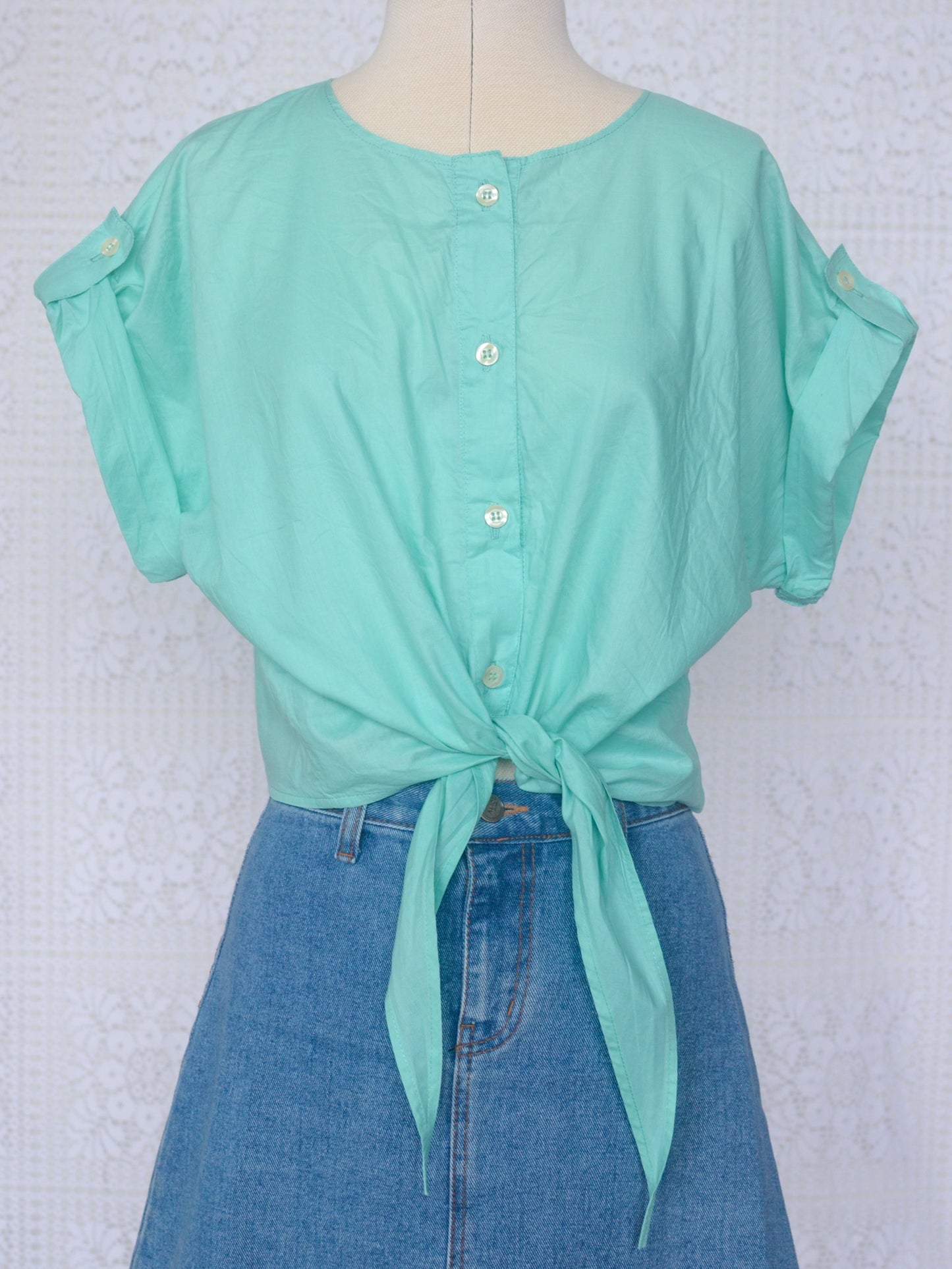 1980s style turquoise green tie waist cropped short sleeve button up top