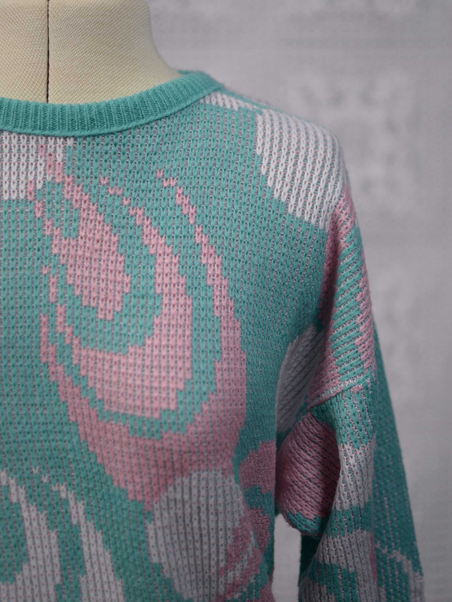 1980s mint green, pink and white abstract pattern jumper