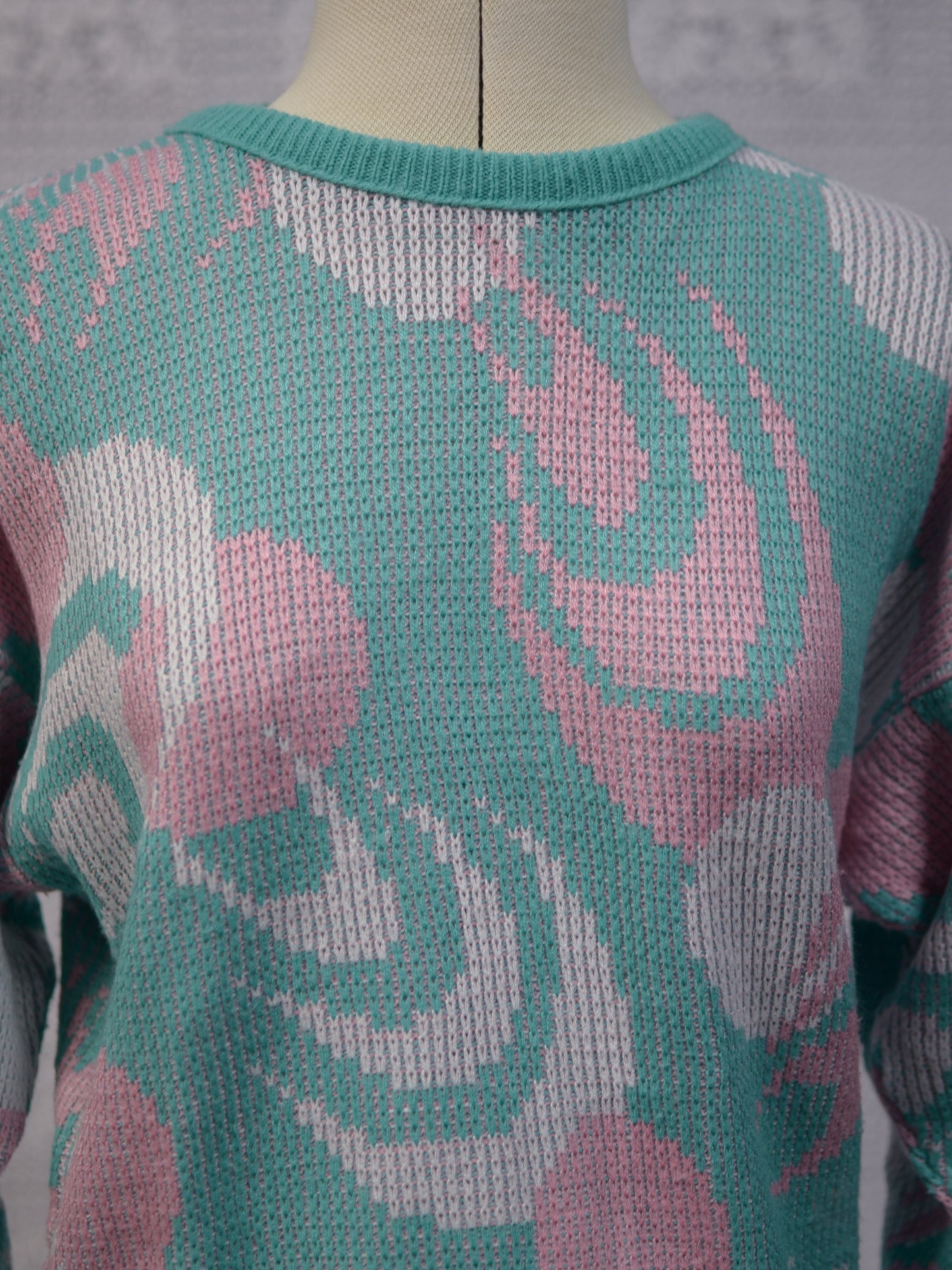 1980s mint green, pink and white abstract pattern jumper