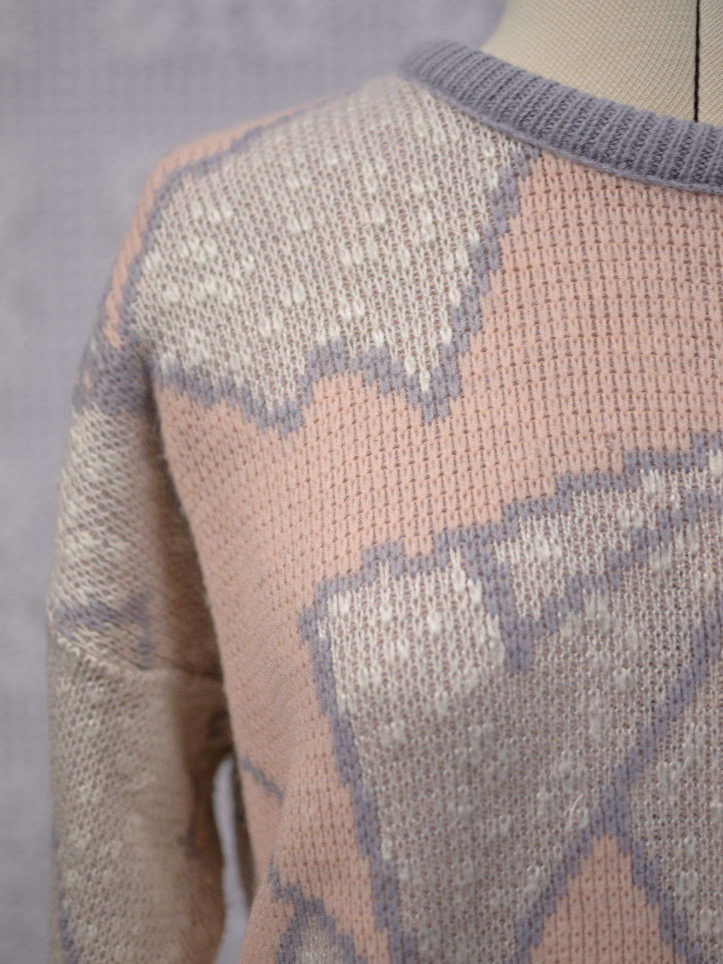 1980s pale pink and light blue abstract geometric pattern jumper
