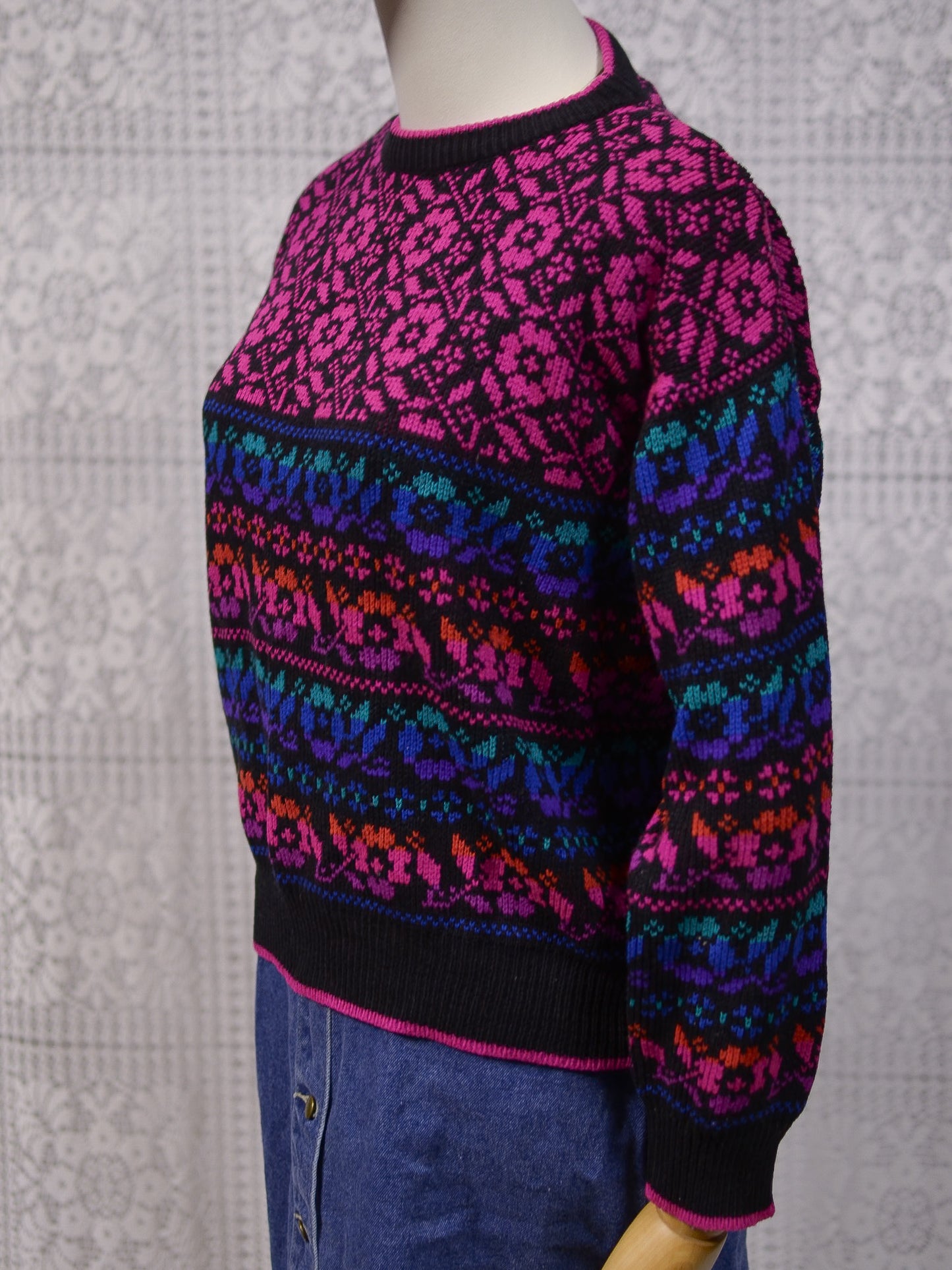 1980s black, pink, blue, purple and green floral pattern jumper