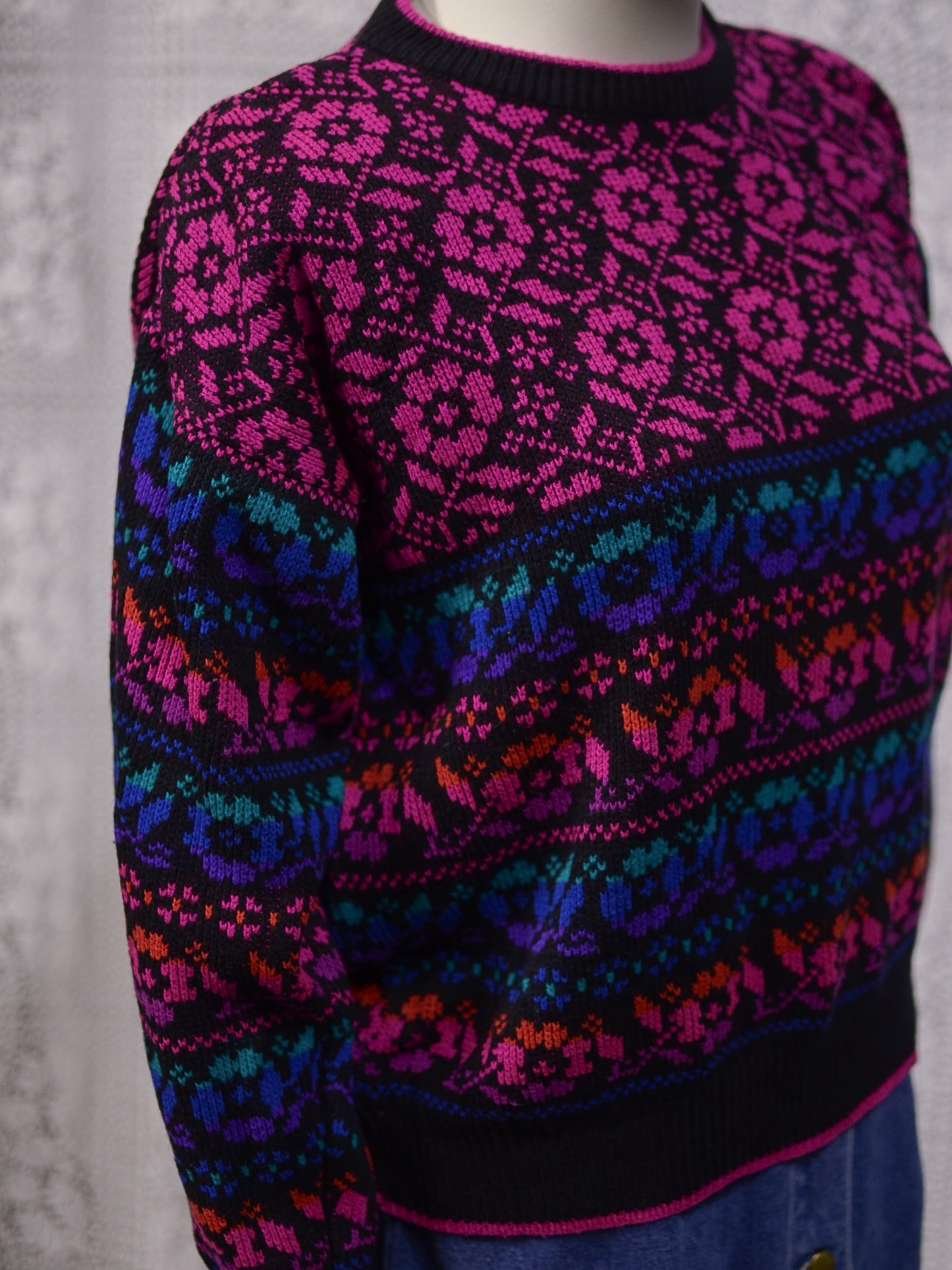 1980s black, pink, blue, purple and green floral pattern jumper