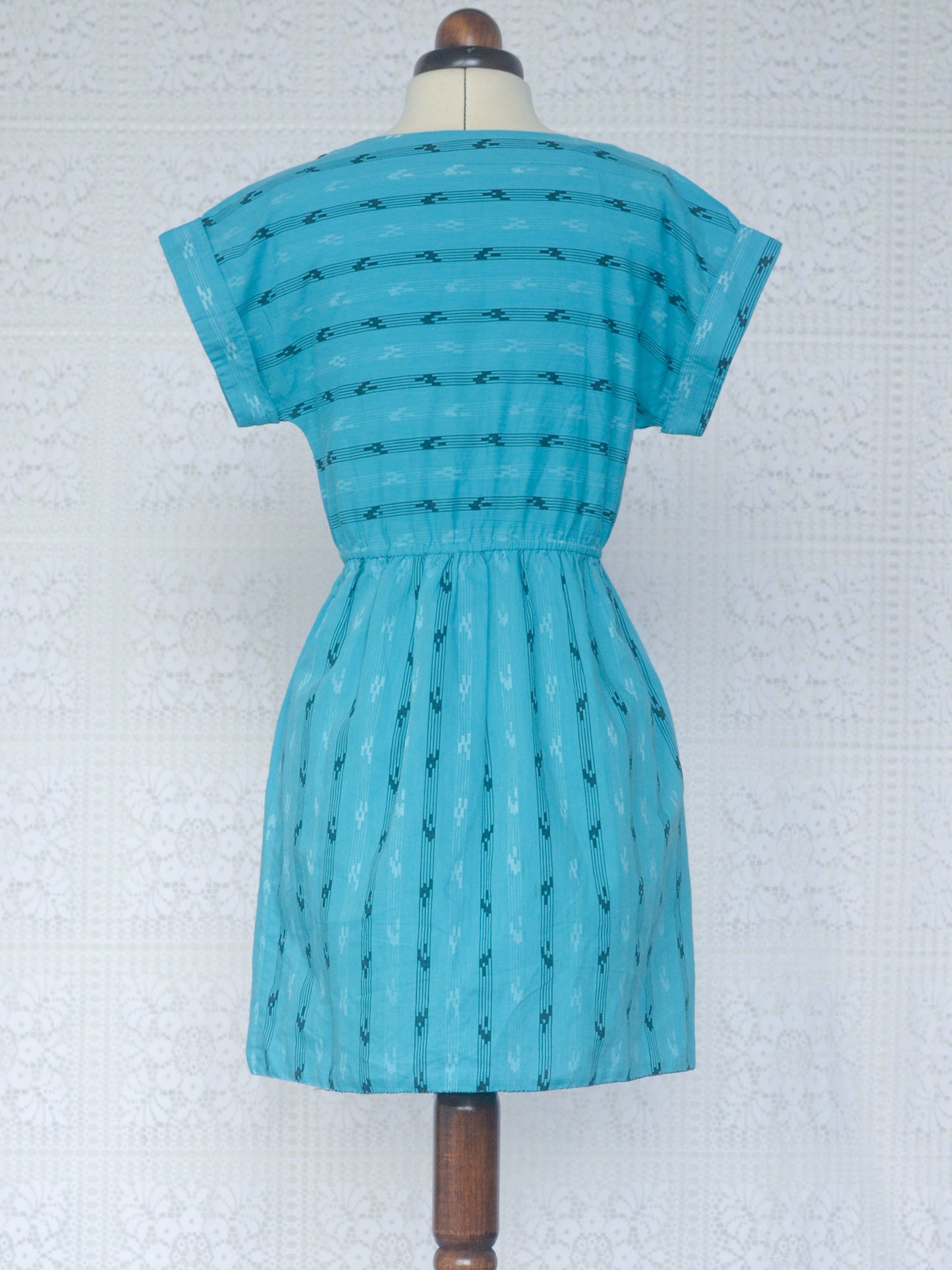 1980s turquoise and black aztec pattern short sleeve mini dress